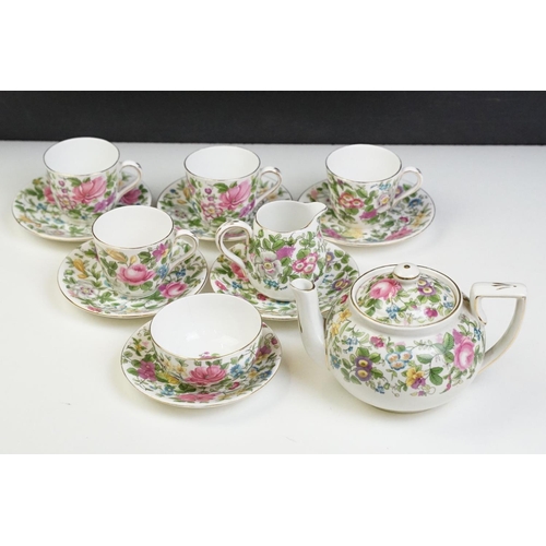 55 - Early 20th Century Crown Staffordshire part tea service including four tea cups, six saucers, tea po... 