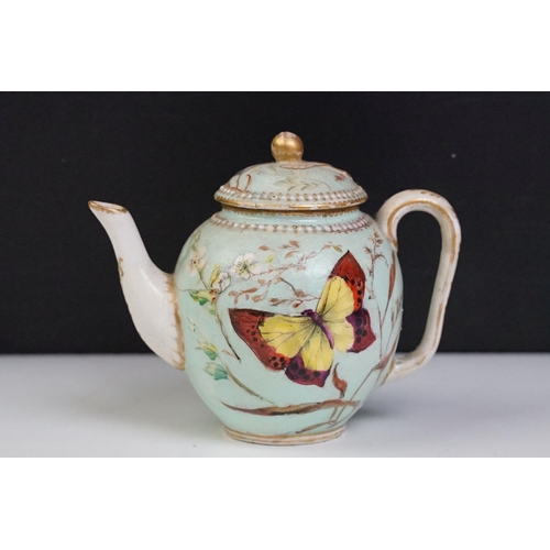 56 - Royal Worcester porcelain cabaret tea set with hand painted butterfly, floral and foliate decoration... 