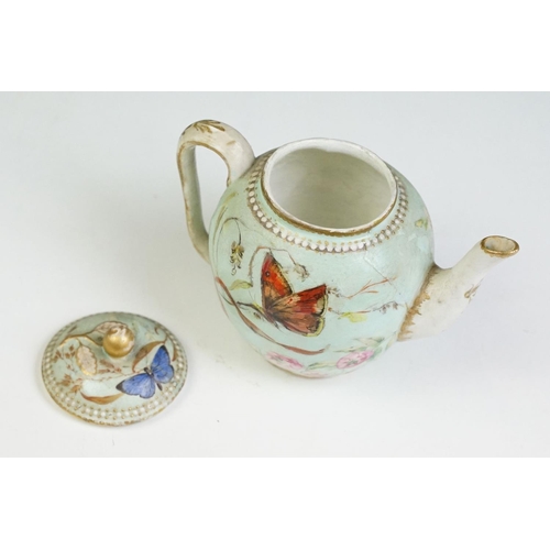 56 - Royal Worcester porcelain cabaret tea set with hand painted butterfly, floral and foliate decoration... 