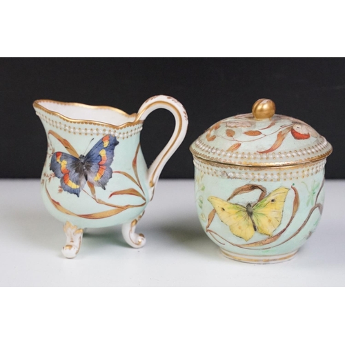 56 - Royal Worcester porcelain cabaret tea set with hand painted butterfly, floral and foliate decoration... 