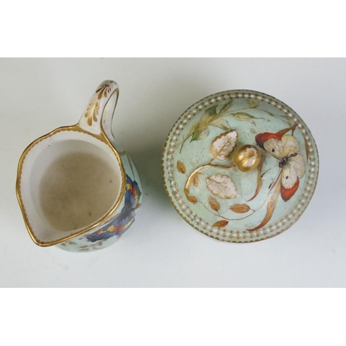 56 - Royal Worcester porcelain cabaret tea set with hand painted butterfly, floral and foliate decoration... 