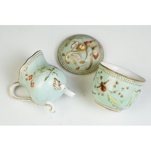 56 - Royal Worcester porcelain cabaret tea set with hand painted butterfly, floral and foliate decoration... 