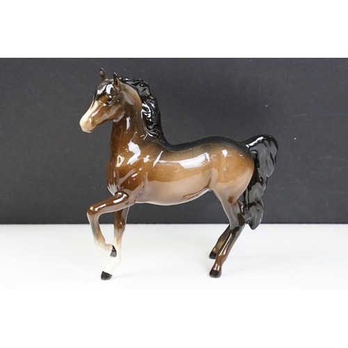 62 - Beswick - Three Beswick brown gloss horses (tallest approx 21.5cm) and a Beswick Donkey (matt finish... 