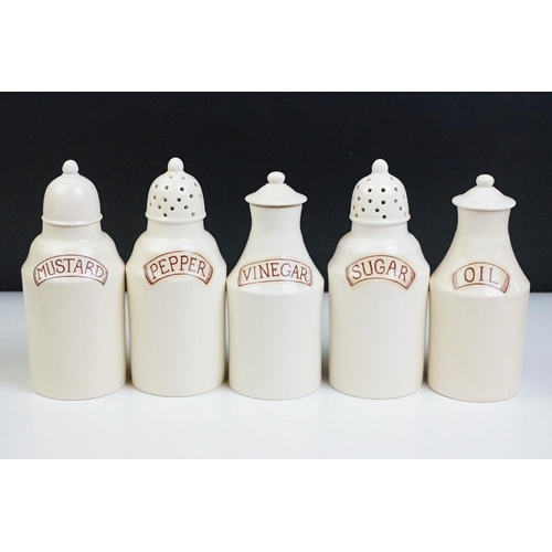 66 - Large Leeds creamware cruet set, the stand with a band of geometric piercing, impressed mark to base... 