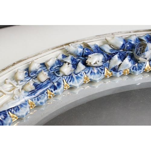 67 - Sitzendorf porcelain dressing table mirror with blue & white floral encrusting, putti with garland t... 