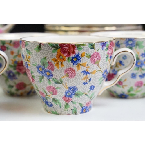 68 - Royal Winton / Grimwades ' Old Cottage Chintz ' pattern tea set, to include teapot, water jug, 12 te... 