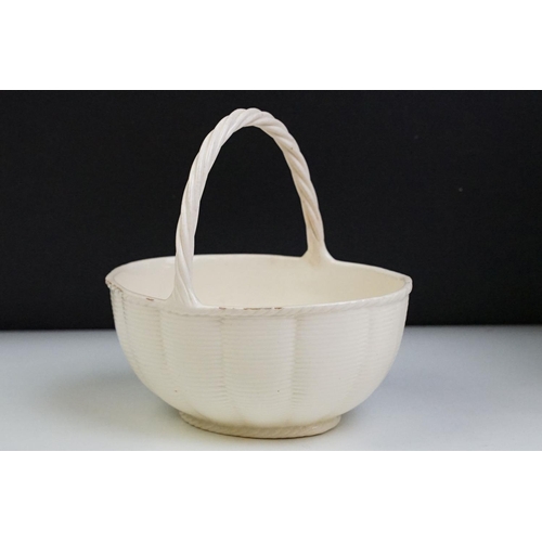 73 - Wedgwood Creamware Sweet Basket, with rolled handle and wickerwork moulding, stamped to base, circa ... 