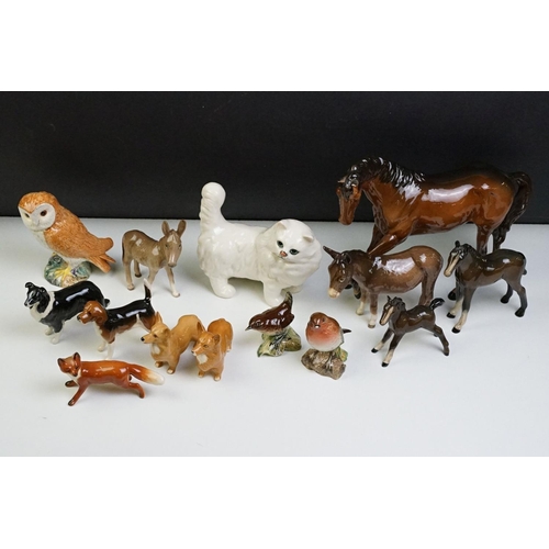 76 - Collection of 14 Beswick porcelain animal & bird figures, to include brown gloss horse (18cm tall), ... 