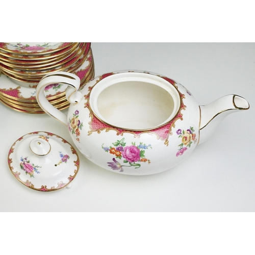 81 - Aynsley porcelain floral tea set, pattern no. B971, to include teapot, 8 cups, 9 saucers, 7 tea plat... 