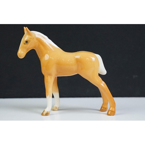 96 - Collection of 10 Beswick porcelain horses to include five Palomino and five brown gloss examples (fe... 