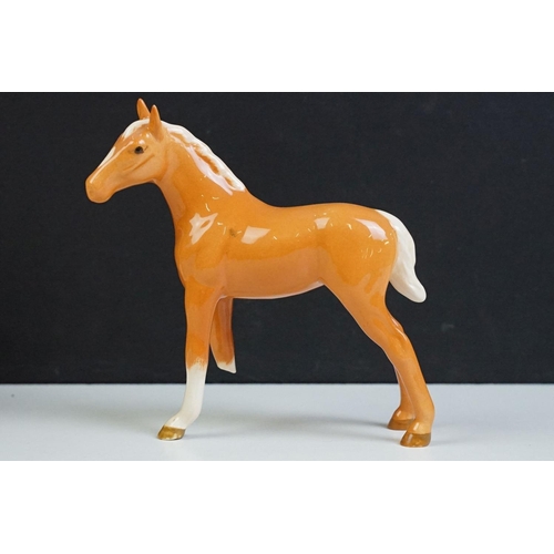 96 - Collection of 10 Beswick porcelain horses to include five Palomino and five brown gloss examples (fe... 