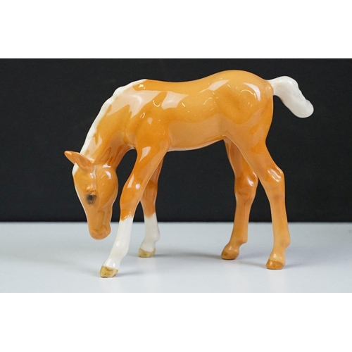 96 - Collection of 10 Beswick porcelain horses to include five Palomino and five brown gloss examples (fe... 