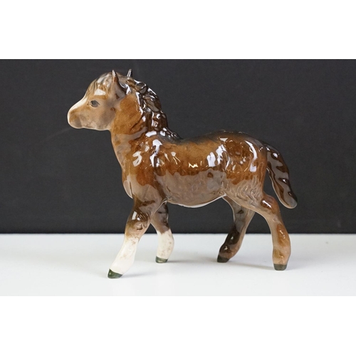 96 - Collection of 10 Beswick porcelain horses to include five Palomino and five brown gloss examples (fe... 