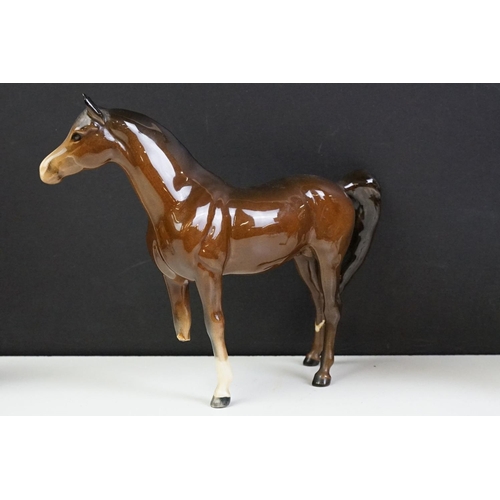 96 - Collection of 10 Beswick porcelain horses to include five Palomino and five brown gloss examples (fe... 