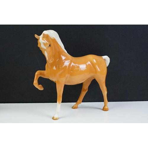 96 - Collection of 10 Beswick porcelain horses to include five Palomino and five brown gloss examples (fe... 