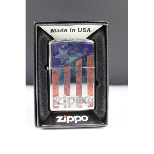 278 - A collection of six boxed Zippo lighters to include Texas Twister, Skull, USA Flag, Vintage Brass, P... 