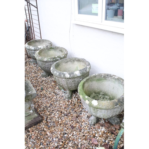 527 - Set of four large reconstituted stone planters with grape & vine decoration, raised upon claw feet. ... 