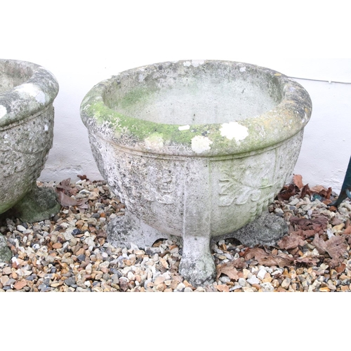 527 - Set of four large reconstituted stone planters with grape & vine decoration, raised upon claw feet. ... 