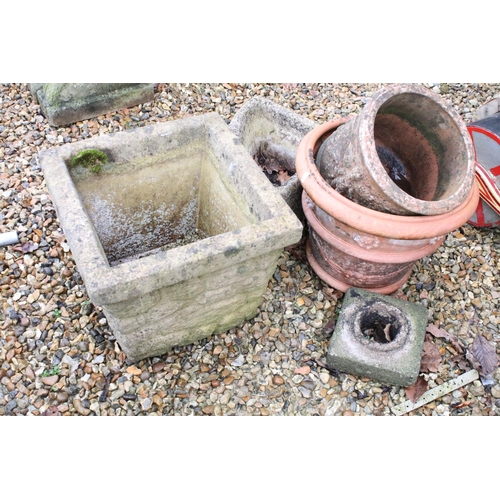 533 - Two reconstituted stone planters (largest approx 37cm high), together with two terracotta examples