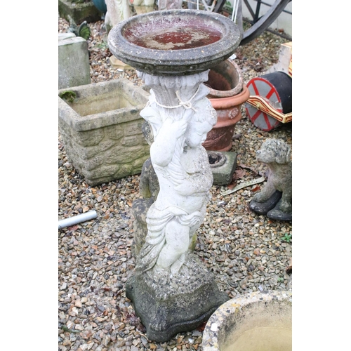 534 - Reconstituted stone bird bath in the form of a classical maiden (approx 95cm high), together with a ... 