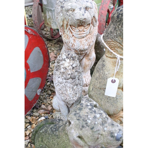 535 - Group of reconstituted stone garden ornaments in the form of animals to include lions, dogs, squirre... 