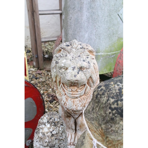 535 - Group of reconstituted stone garden ornaments in the form of animals to include lions, dogs, squirre... 