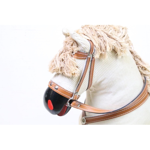 364 - Contemporary fabric-covered wooden rocking horse, with leather saddle & stirrups, mane & tail, appro... 