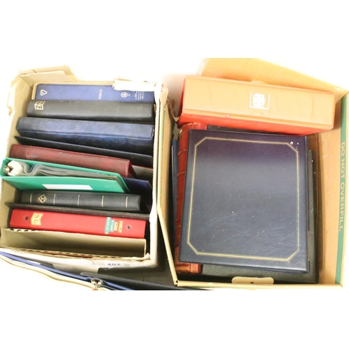 402 - A collection of empty stamp albums and stock books contained within two boxes.