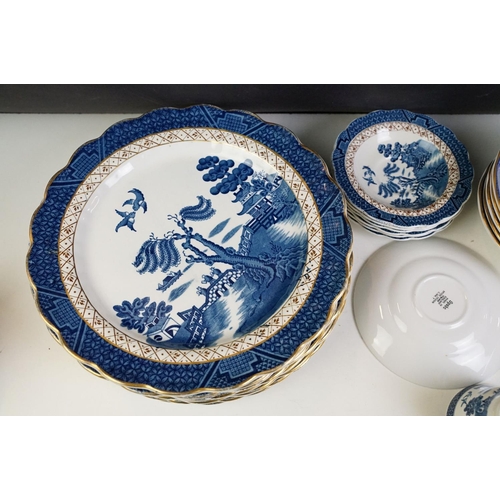 104 - Royal Doulton / Booths ' Real Old Willow ' pattern part dinner service