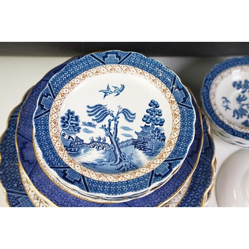 104 - Royal Doulton / Booths ' Real Old Willow ' pattern part dinner service