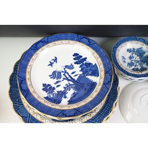 104 - Royal Doulton / Booths ' Real Old Willow ' pattern part dinner service