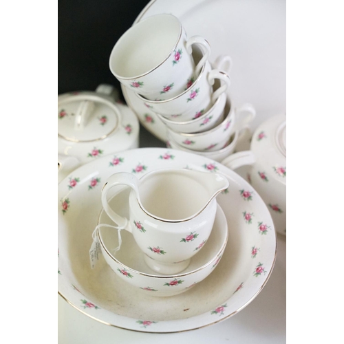 108 - 20th Century Limoges of France tea set with pink rose decoration (teapot, 12 cups & saucers, milk ju... 