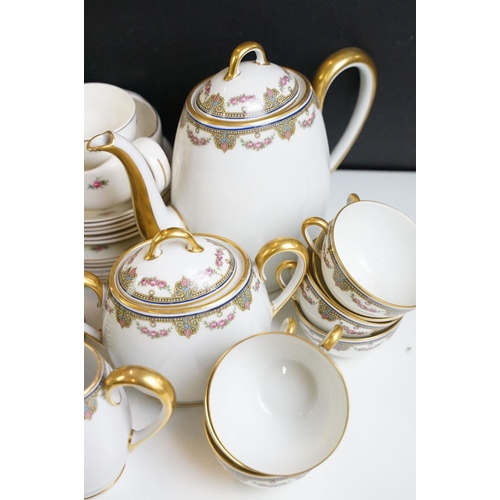 108 - 20th Century Limoges of France tea set with pink rose decoration (teapot, 12 cups & saucers, milk ju... 