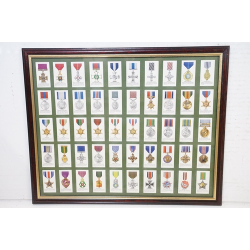 430 - A collection of seven framed and glazed set of cigarette cards together with two framed and glazed m... 