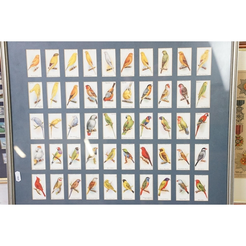 430 - A collection of seven framed and glazed set of cigarette cards together with two framed and glazed m... 