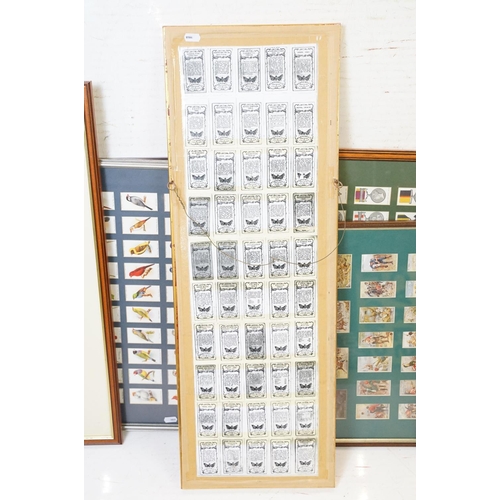 430 - A collection of seven framed and glazed set of cigarette cards together with two framed and glazed m... 