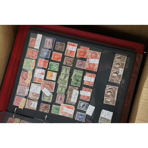 403 - A collection of mainly British stamps to include mint examples together with a quantity of empty sta... 