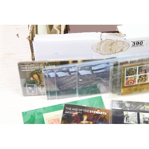 390 - A collection of mainly British stamps to include coin covers, a large group of presentation packs an... 