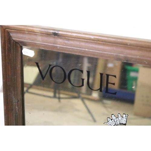 542 - Advertising Mirror - ' Vogue ' decorated with a 1920's lady riding a peacock, 50cm x 60cm