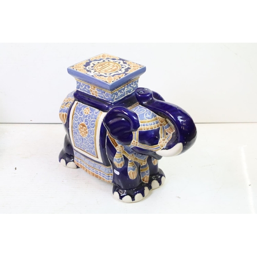 77 - Three 20th century Chinese ceramic elephant garden seats, two with blue ground glaze, the other on w... 