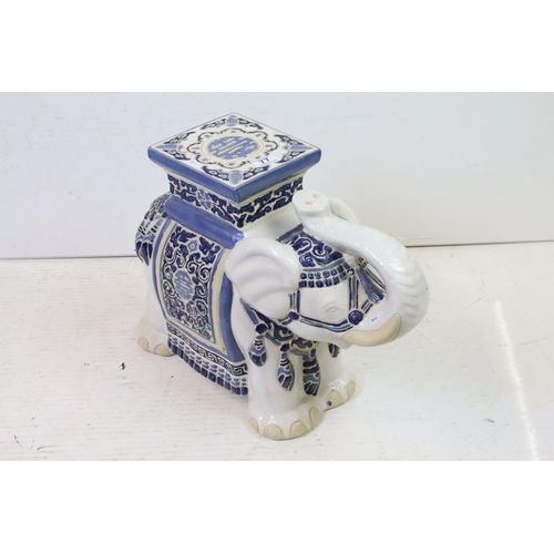 77 - Three 20th century Chinese ceramic elephant garden seats, two with blue ground glaze, the other on w... 