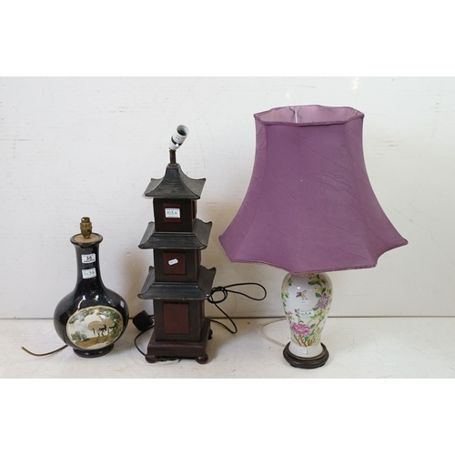 103A - Three table lamps to include a pottery baluster form example with moulded stork panel (approx 40cm h... 