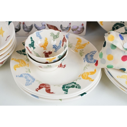 28 - A collection of Emma Bridgewater ceramics to include two Polka Hen dinner plates, two Polka Star din... 