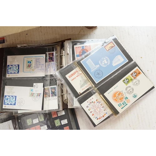 408 - A collection of British, Commonwealth and World stamps both within albums and together with loose ex... 