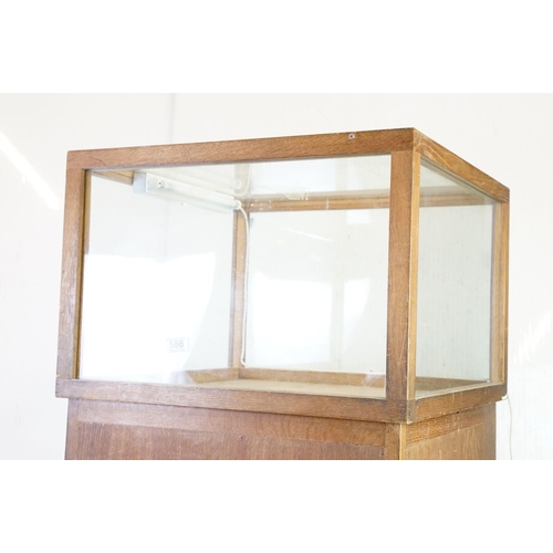 586 - Mid century Square Display Cabinet, the top with glazed panels to all sides and top, raised on a tal... 