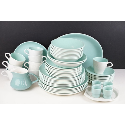 65 - Poole Pottery pale blue twin-tone tea & dinner ware, to include 8 teacups, 10 saucers, serving dish,... 