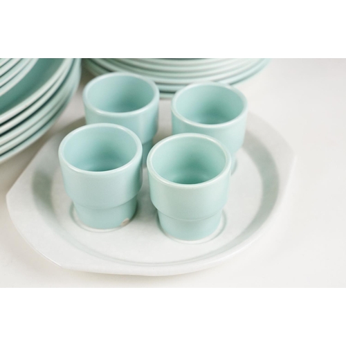 65 - Poole Pottery pale blue twin-tone tea & dinner ware, to include 8 teacups, 10 saucers, serving dish,... 