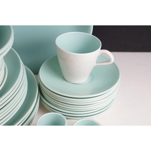 65 - Poole Pottery pale blue twin-tone tea & dinner ware, to include 8 teacups, 10 saucers, serving dish,... 