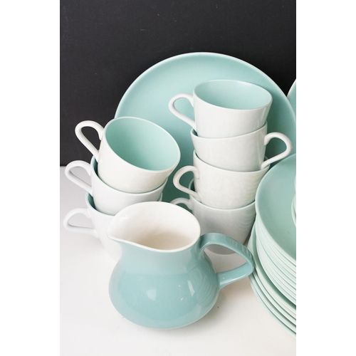 65 - Poole Pottery pale blue twin-tone tea & dinner ware, to include 8 teacups, 10 saucers, serving dish,... 