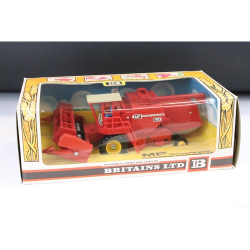 1086 - Boxed Britains 9570 Combine Harvester diecast model in excellent condition with outer slip box